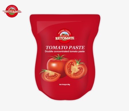 Pojemnik stand-up zawierający 56 g podwójnie skoncentrowanej pasty pomidorowej o czystości od 28% do 100%